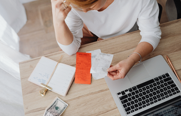 man holding receipts